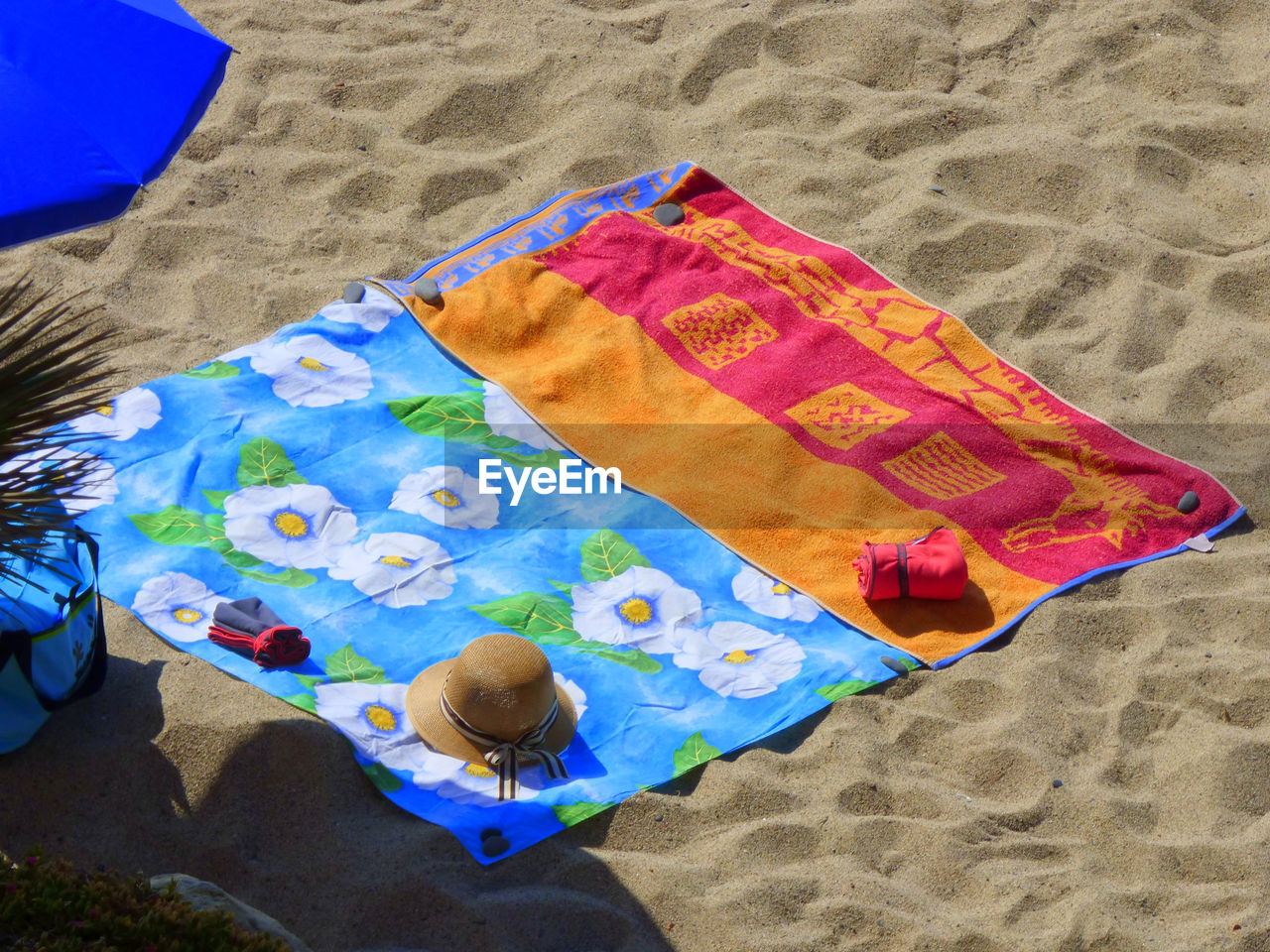High angle view of towels on beach