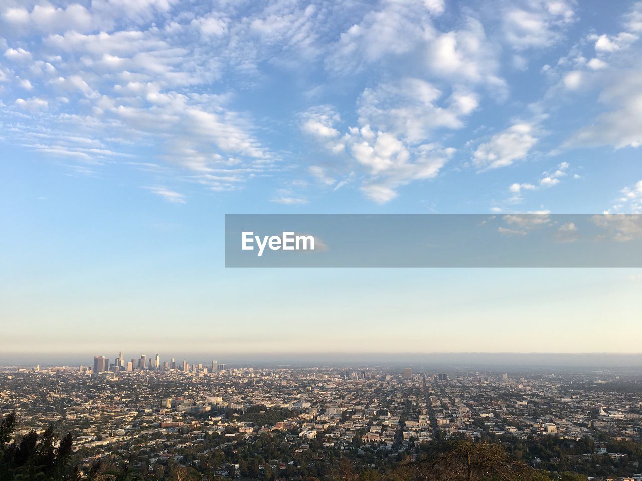 Aerial view of cityscape against sky