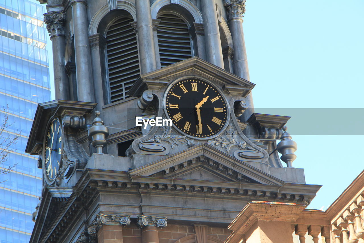 LOW ANGLE VIEW OF CLOCK TOWER