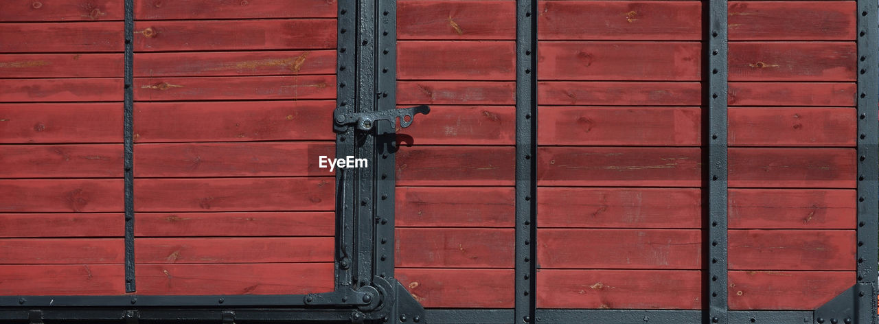 FULL FRAME SHOT OF CLOSED RED WALL