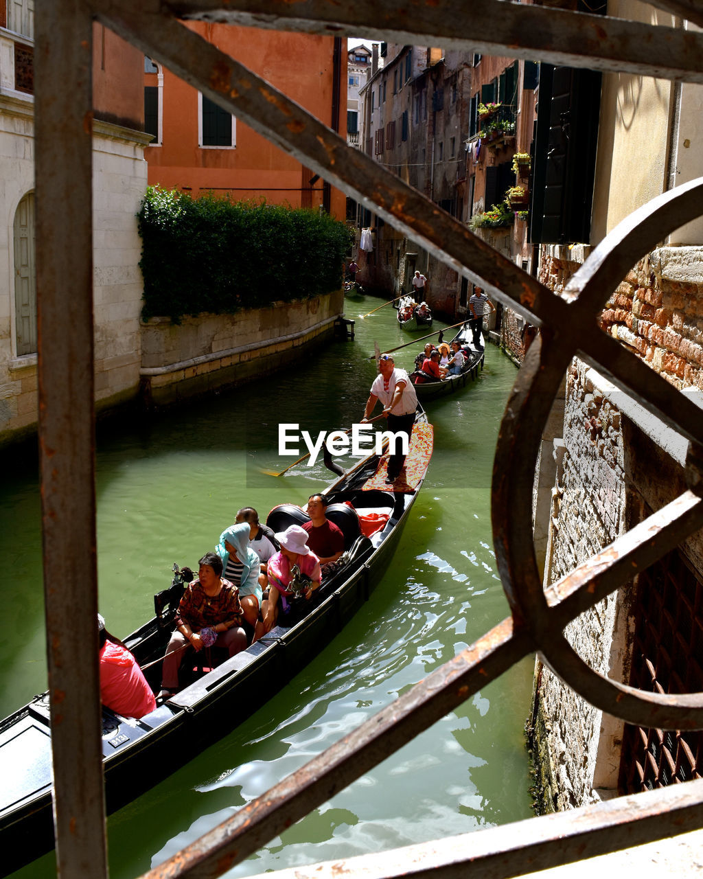 HIGH ANGLE VIEW OF PEOPLE AT FOOTBRIDGE