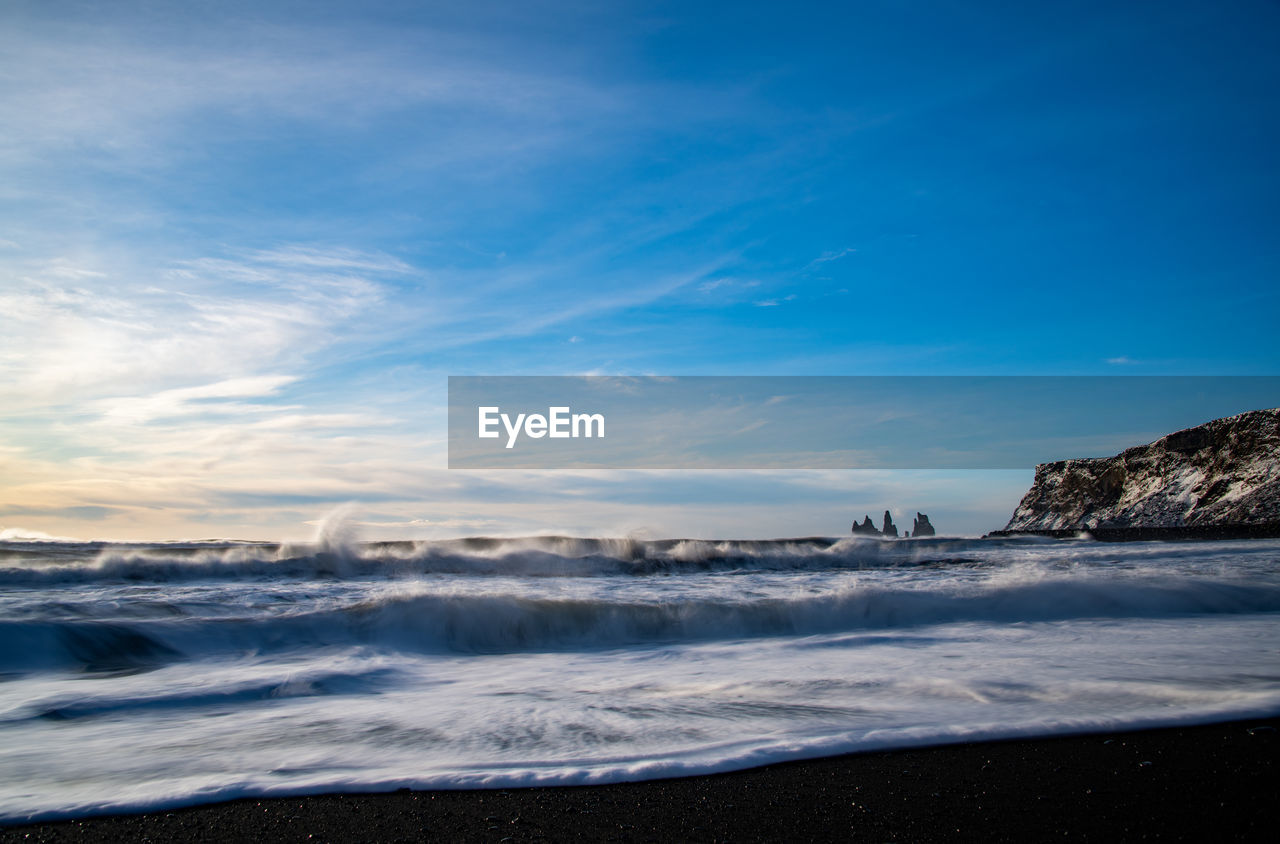 SCENIC VIEW OF SEA AGAINST BLUE SKY