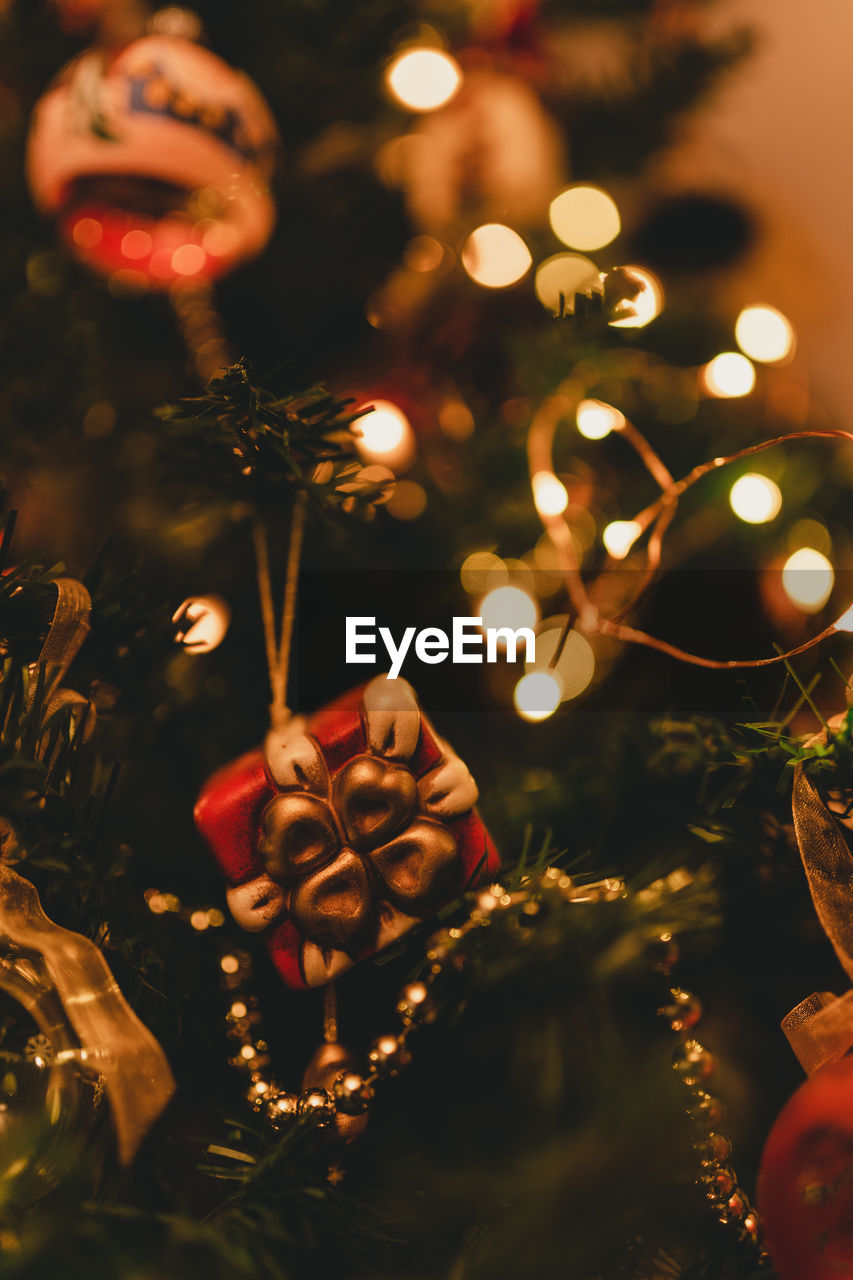 Close-up of illuminated christmas tree at night