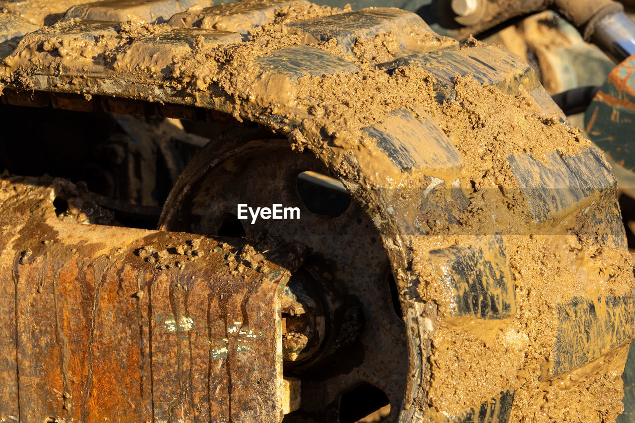 CLOSE-UP OF ABANDONED CAR