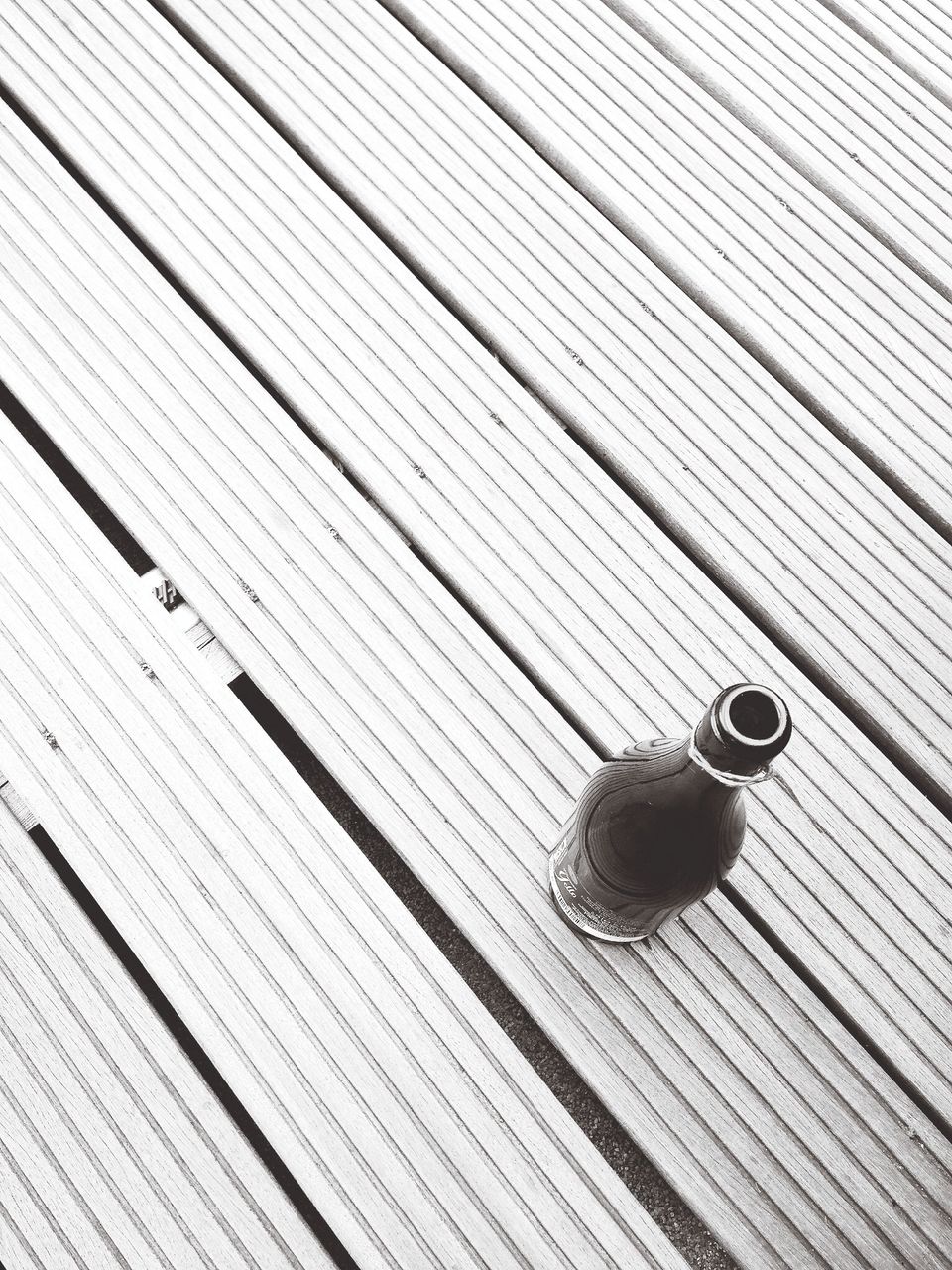 Close-up overhead view of bottle on table