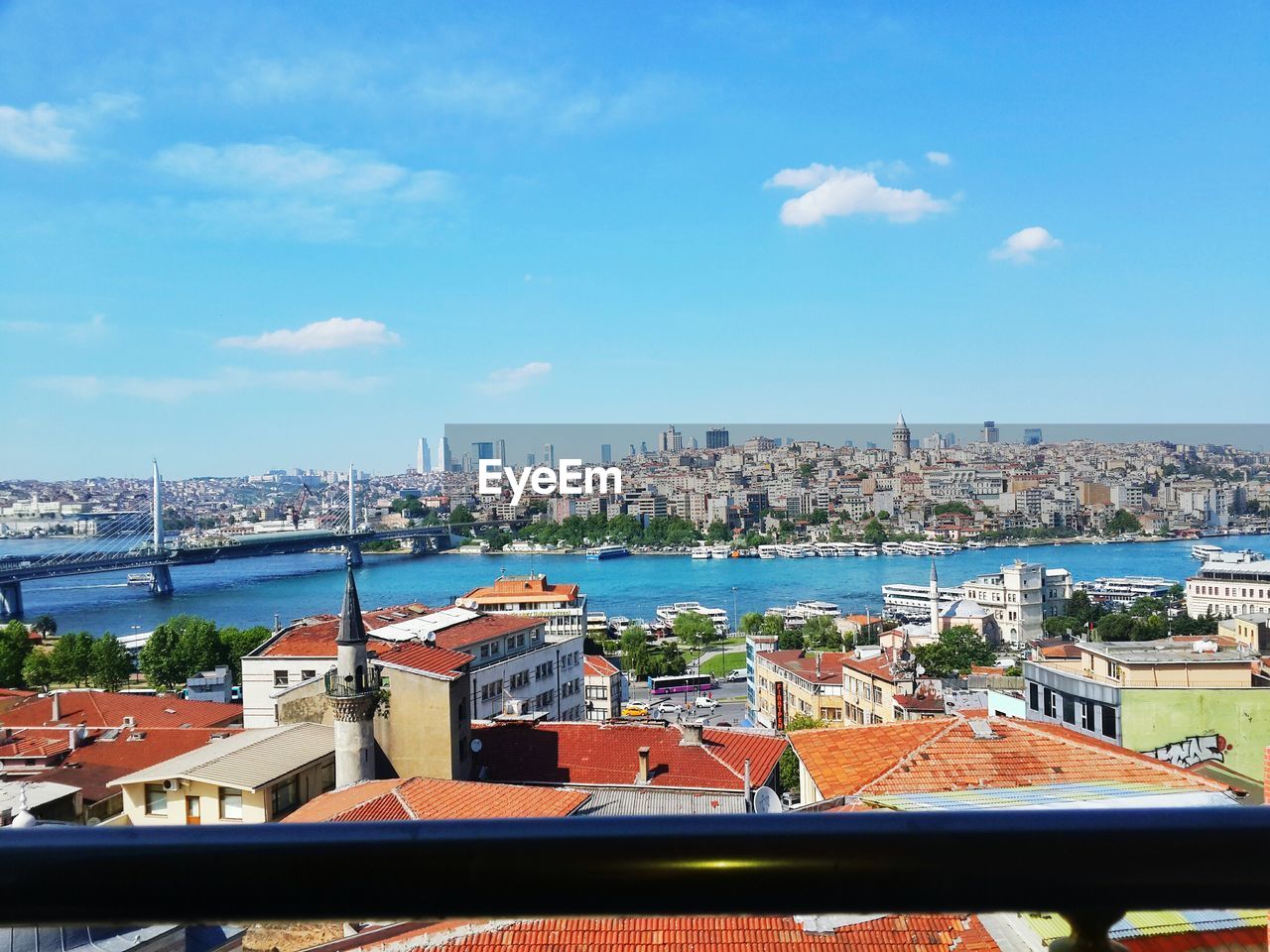 VIEW OF CITYSCAPE WITH WATERFRONT