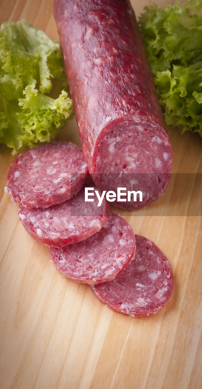 Close-up high angle view of meat on cutting board