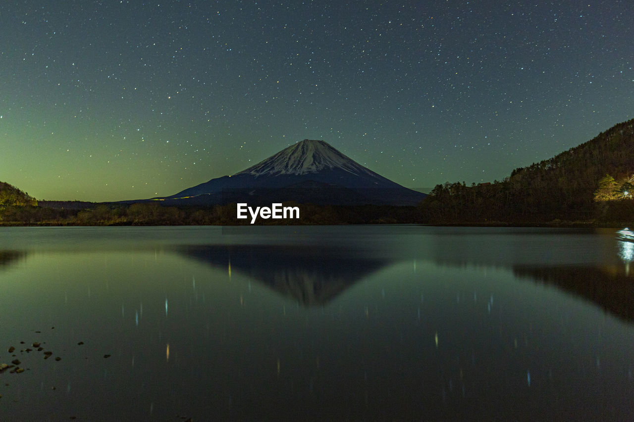 Mt. fuji and the starry sky in lake yamanaka