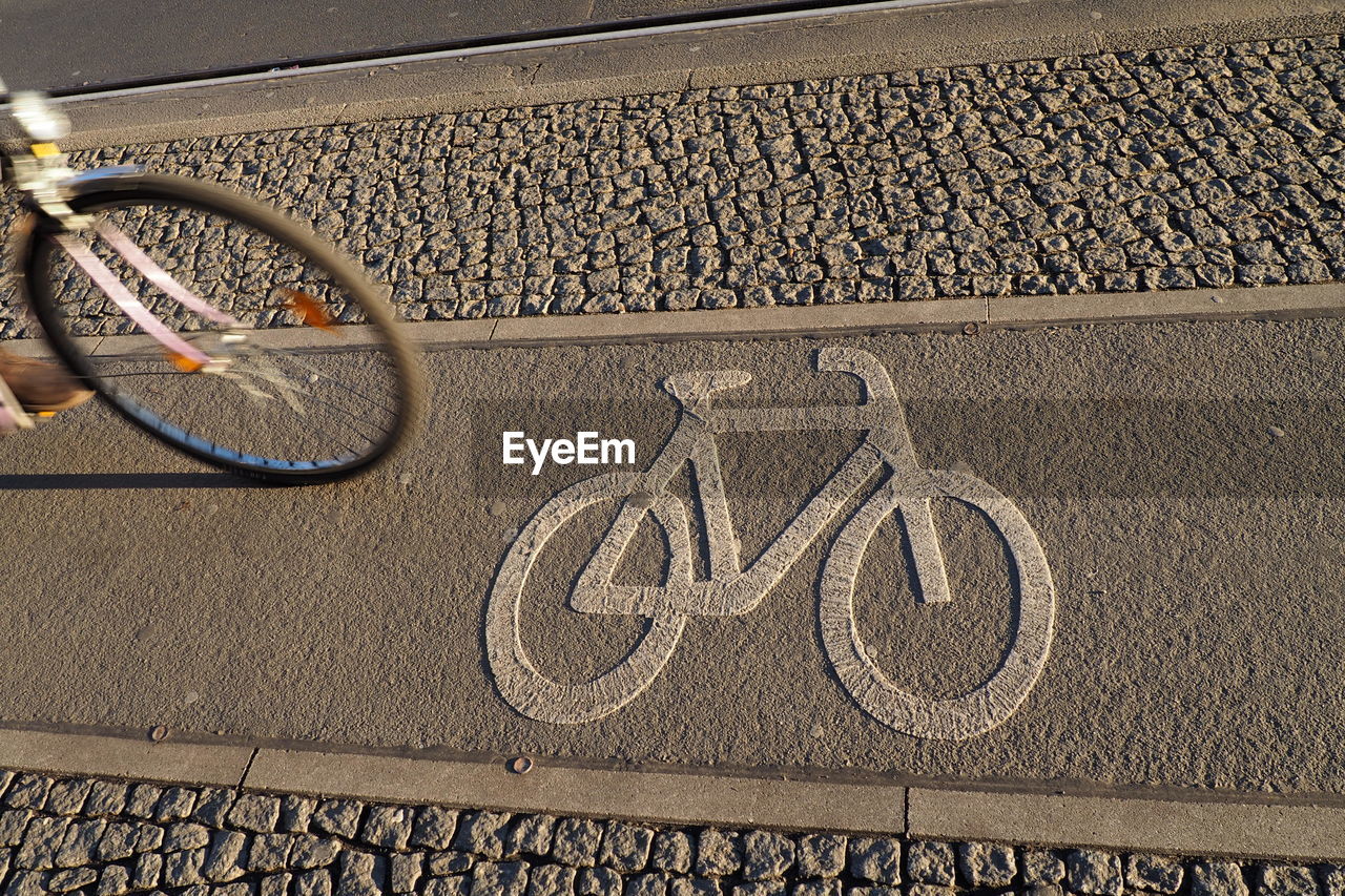 High angle view of bicycle lane symbol