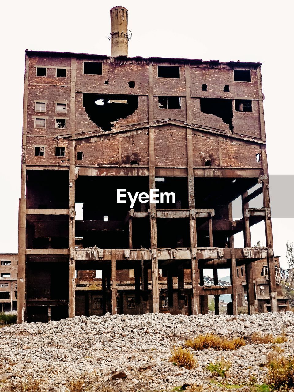 DAMAGED BUILDING AGAINST SKY