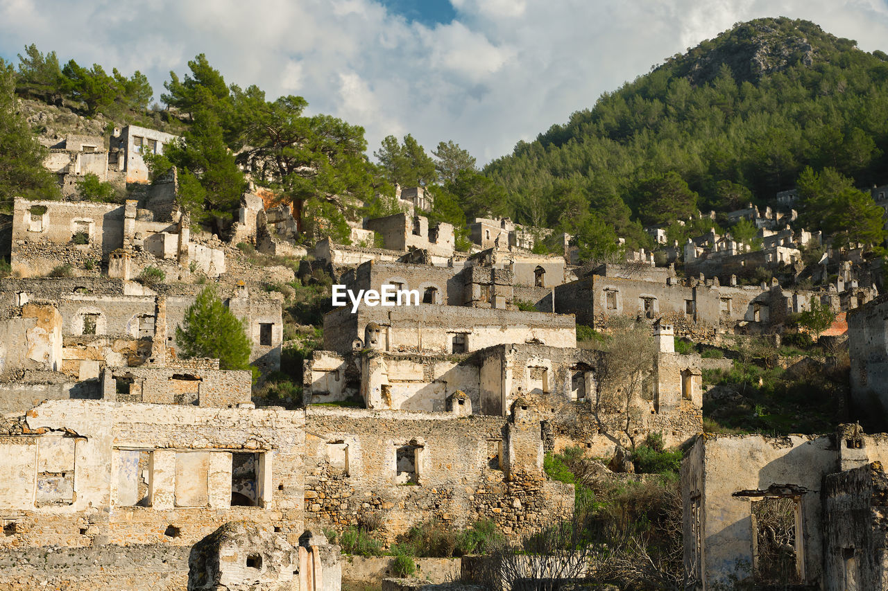 Kayakoy village, abandoned ghost town near fethiye - turkey, ruins of stone houses. 