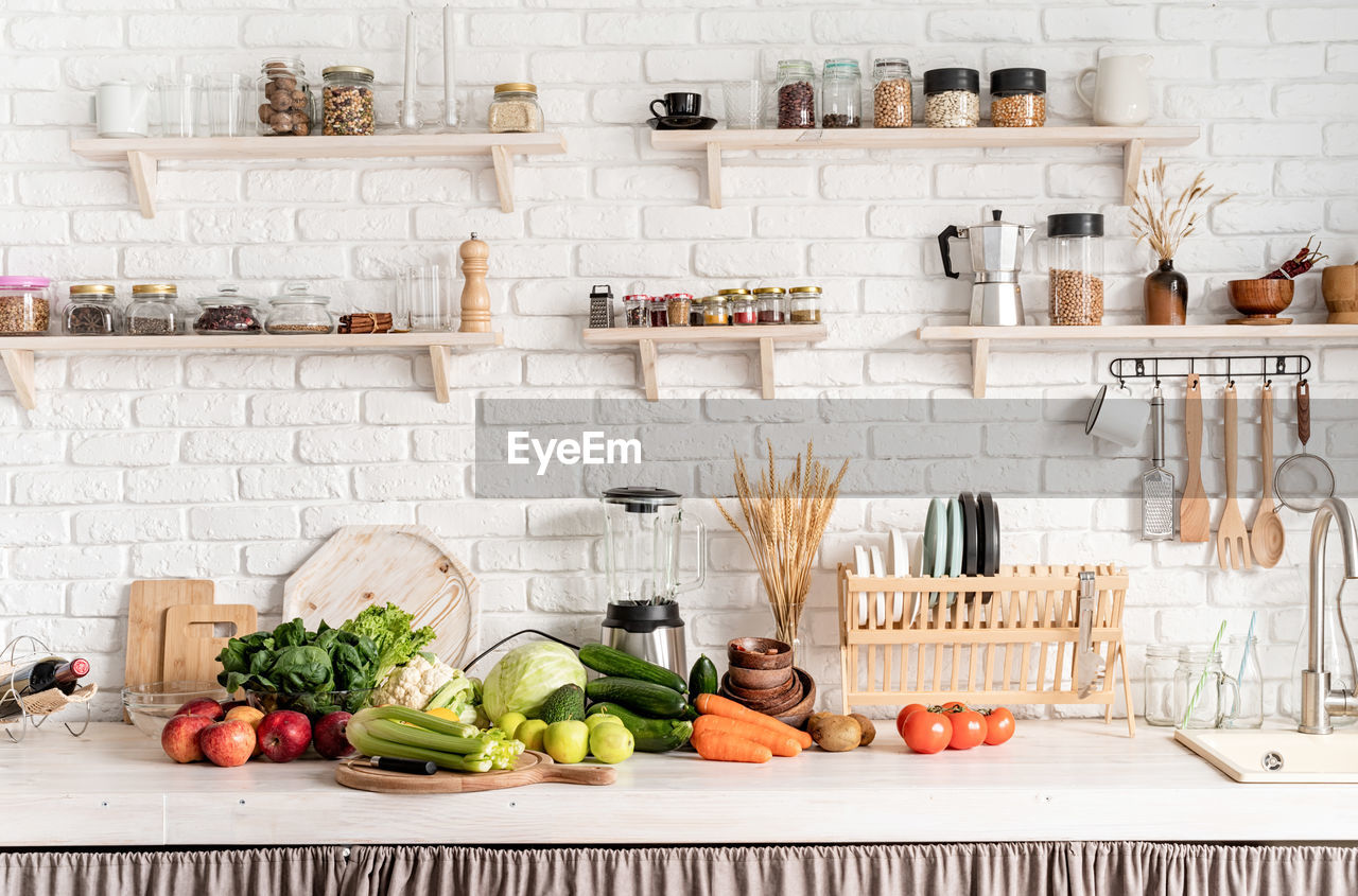 Preparing healthy foods. close up of table with green vegetables in the kitchen