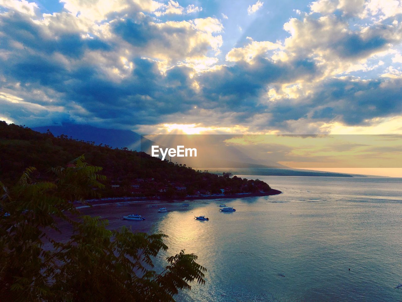 Scenic view of sea against dramatic sky