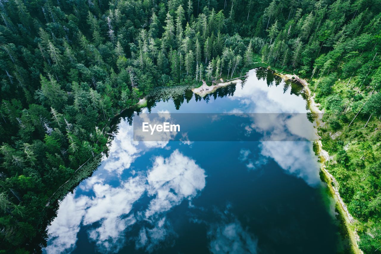 Aerial view of cloud reflections on water, lake eibensee near salzburg, austria.