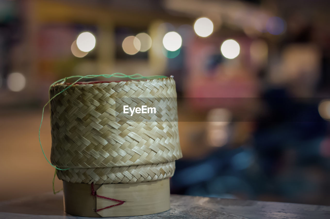 Close-up of wicker basket on table