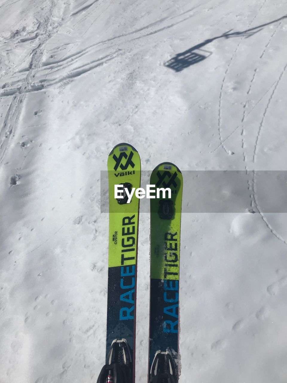 CLOSE-UP OF INFORMATION SIGN ON SNOW