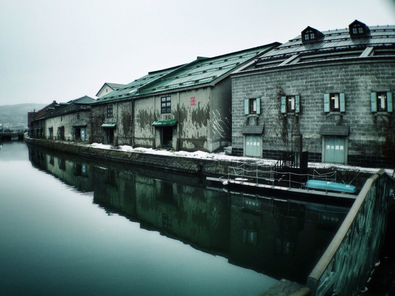 Buildings by river