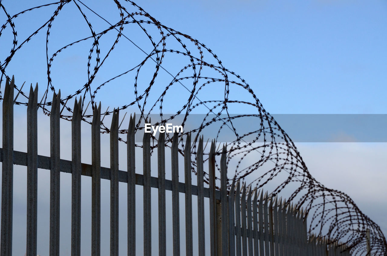 Fence against blue sky