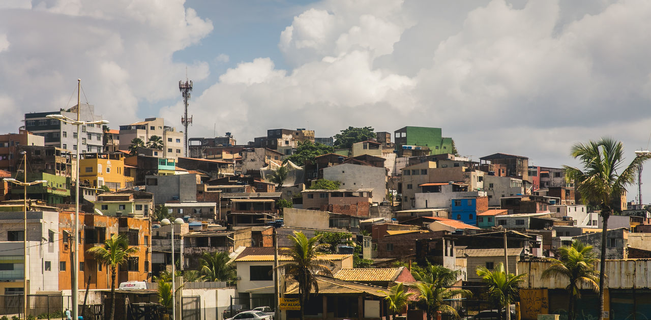 PANORAMIC SHOT OF CITYSCAPE AGAINST SKY