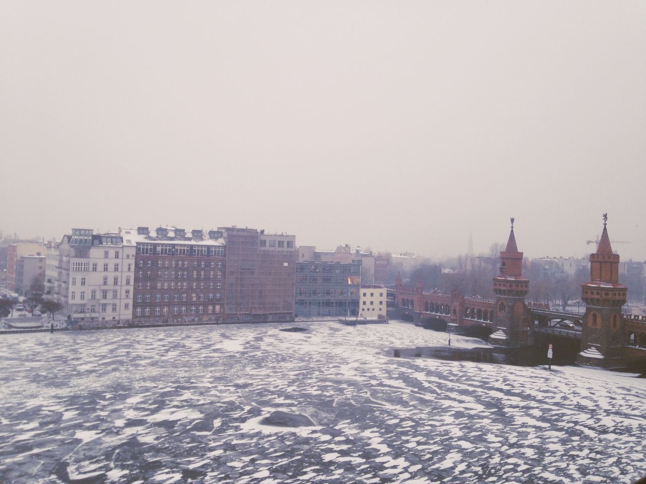 Elevated view of frozen river in city