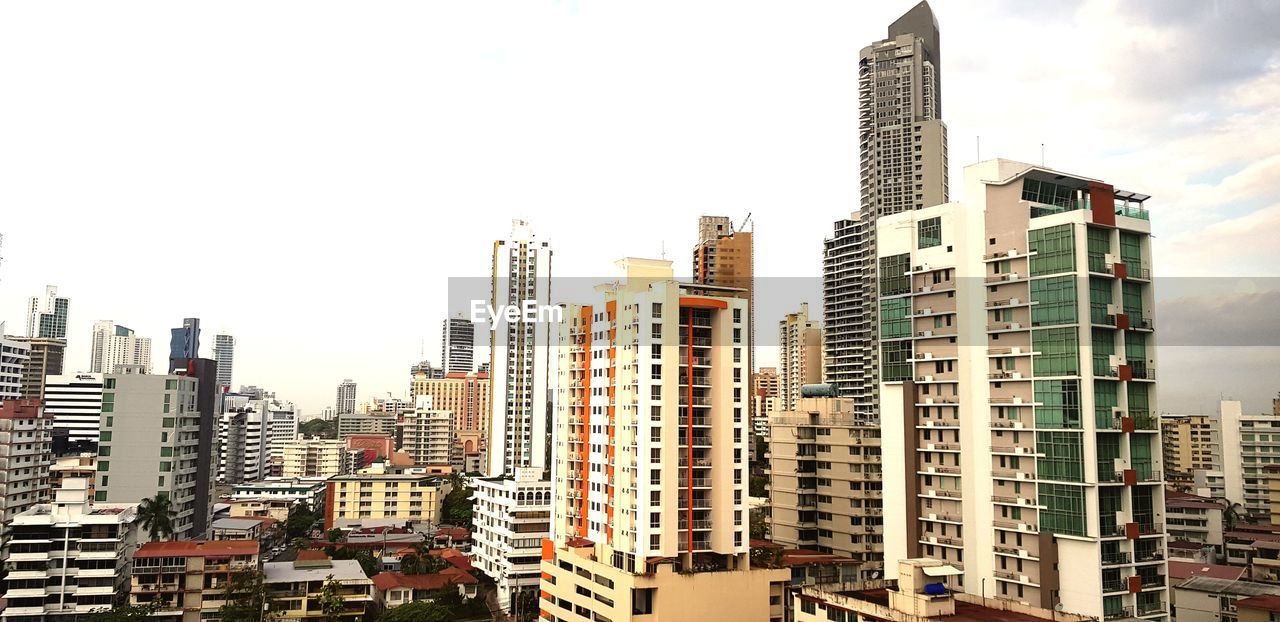 MODERN BUILDINGS AGAINST SKY IN CITY
