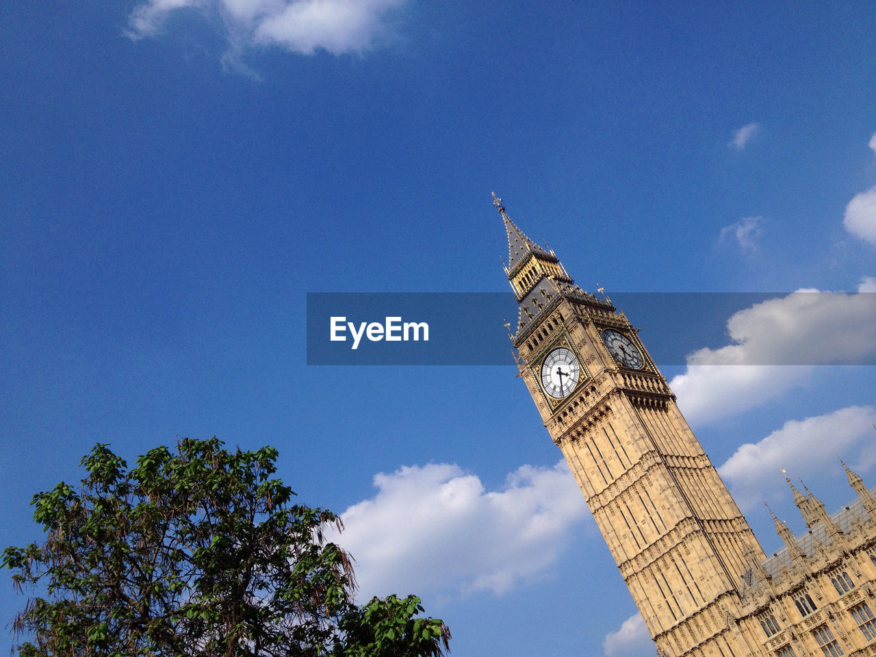 Low angle view of building against blue sky