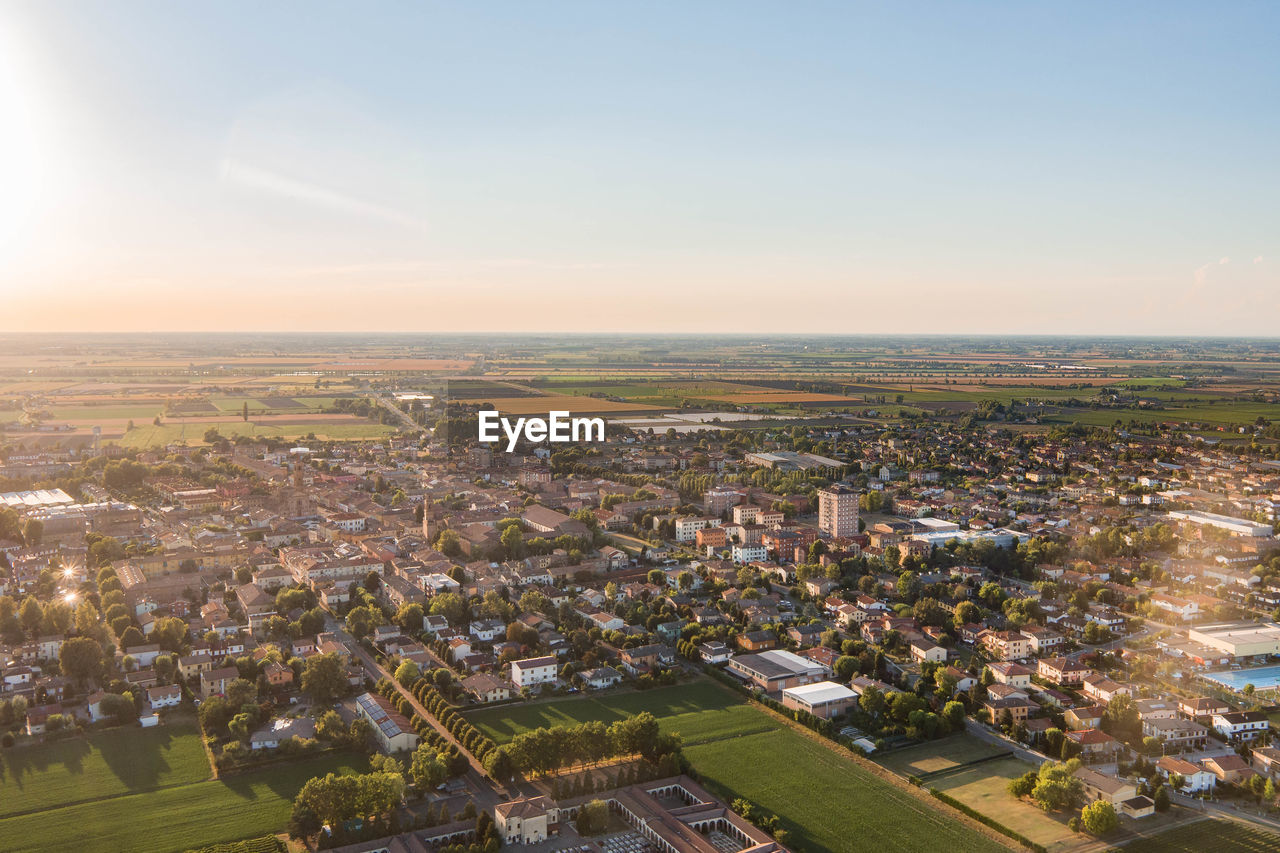 Aerial view of cityscape against clear sky