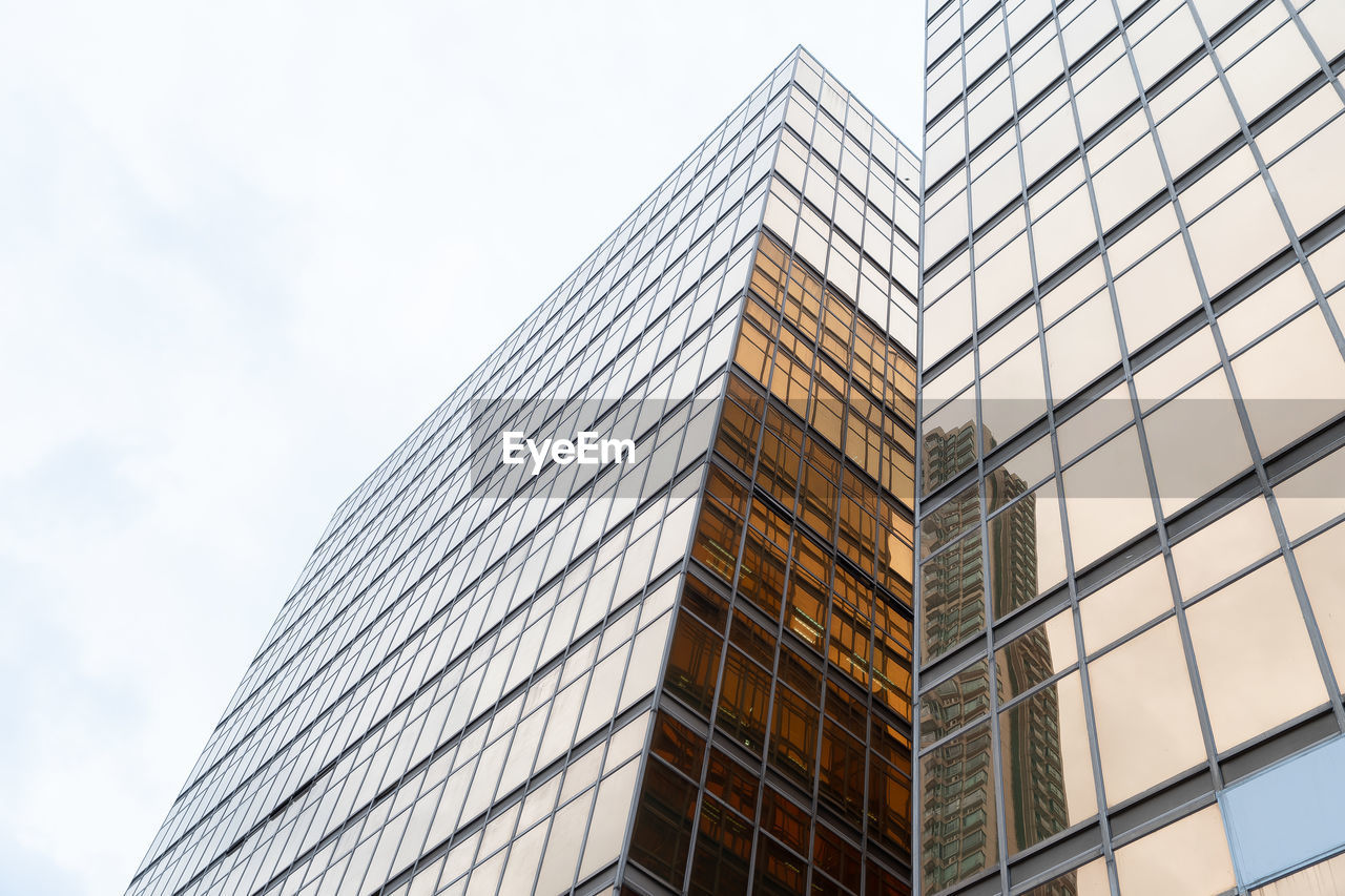 Low angle view of modern building against sky