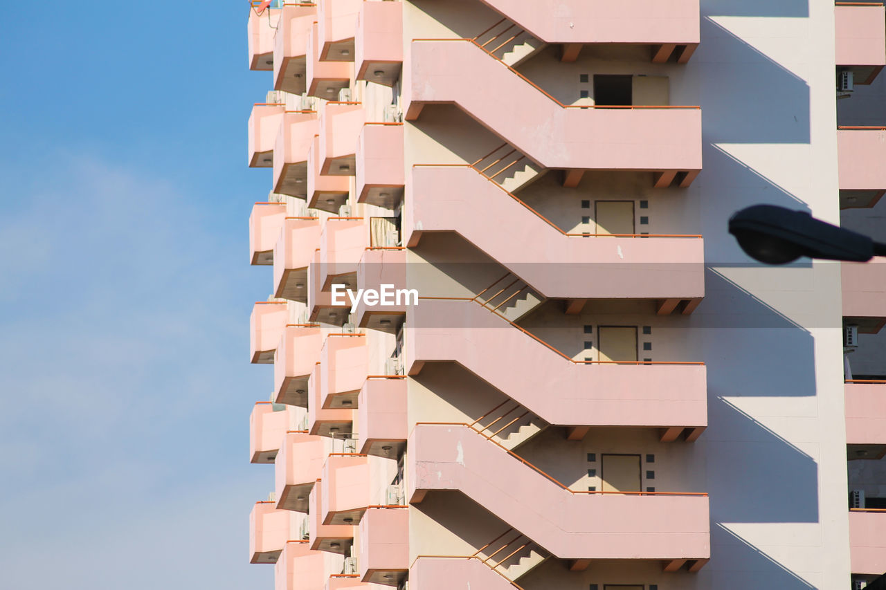 Low angle view of residential building against sky