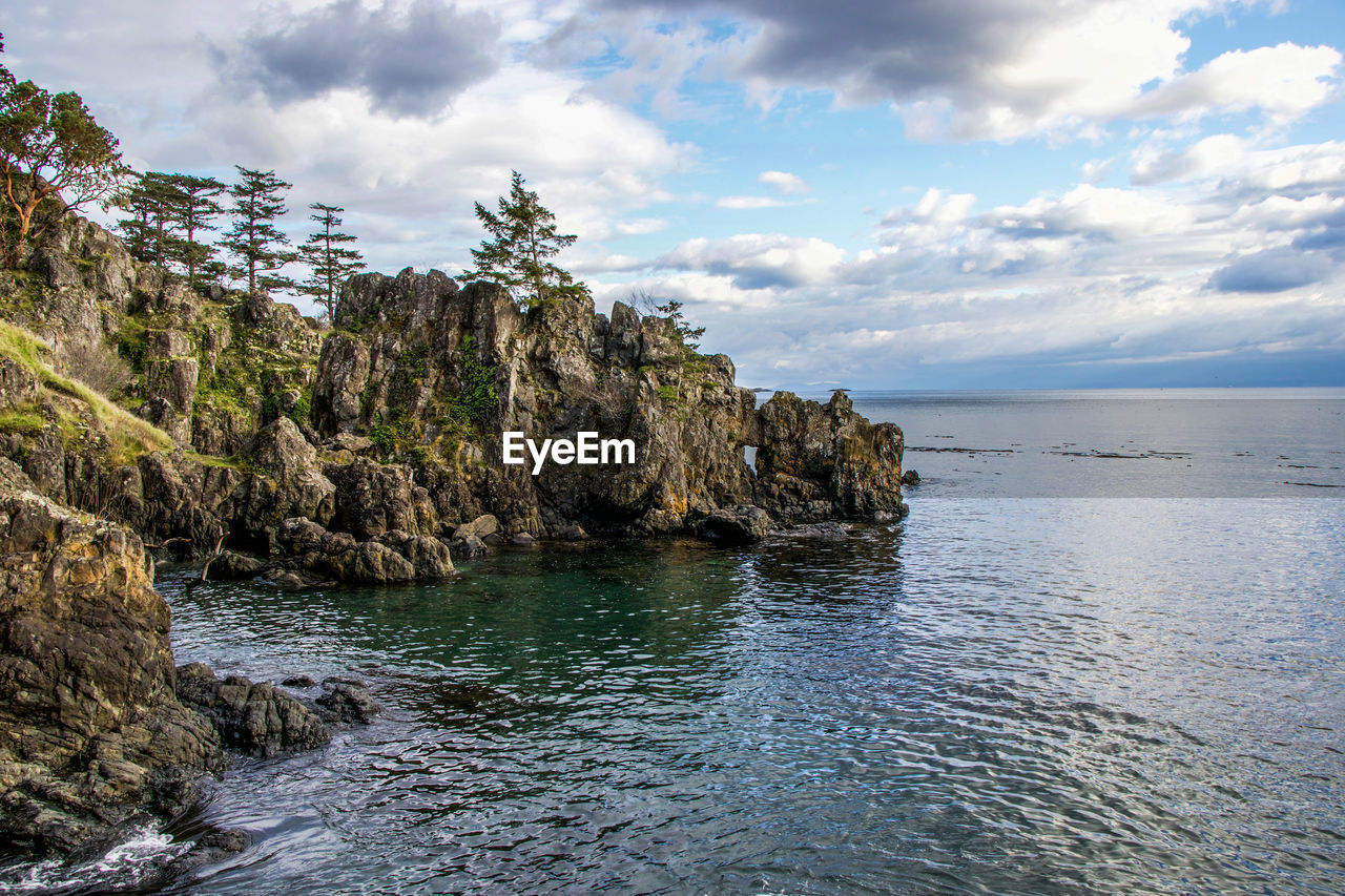 Scenic view of sea against sky at east sooke regional park, bc, canada