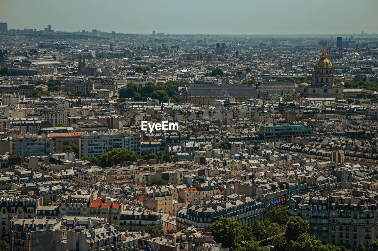 Buildings skyline in a sunny day, seen from the eiffel tower at paris. the famous capital of france.