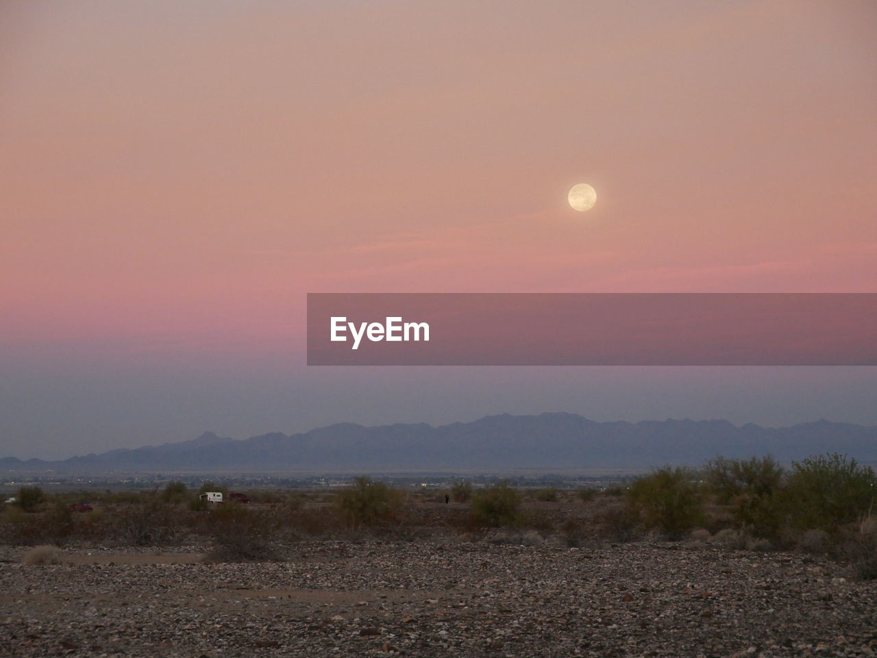 SCENIC VIEW OF FIELD AGAINST SKY DURING SUNSET