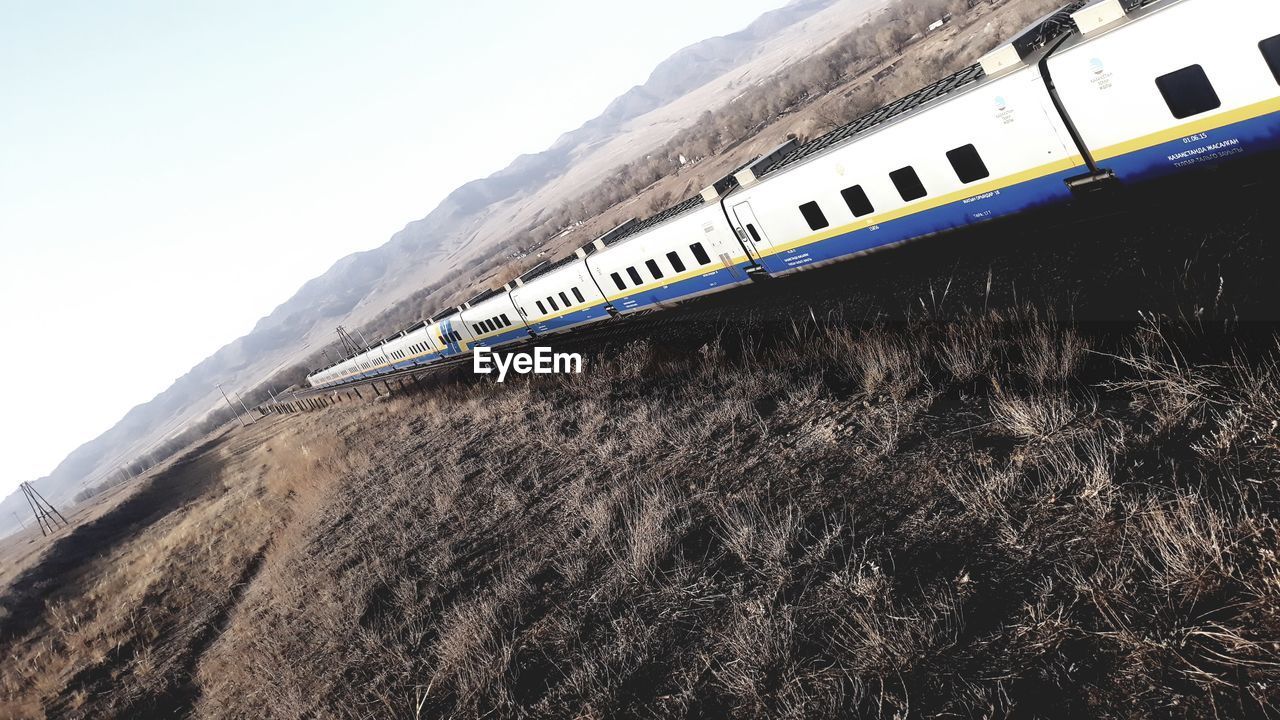 VIEW OF TRAIN AGAINST SKY