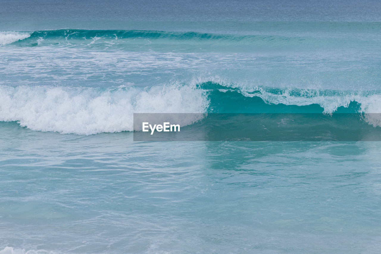 sea, wind wave, water, ocean, wave, motion, beauty in nature, sports, nature, boardsport, shore, land, surfing, water sports, scenics - nature, coast, beach, outdoors, day, blue, azure, power in nature, sky, environment, splashing