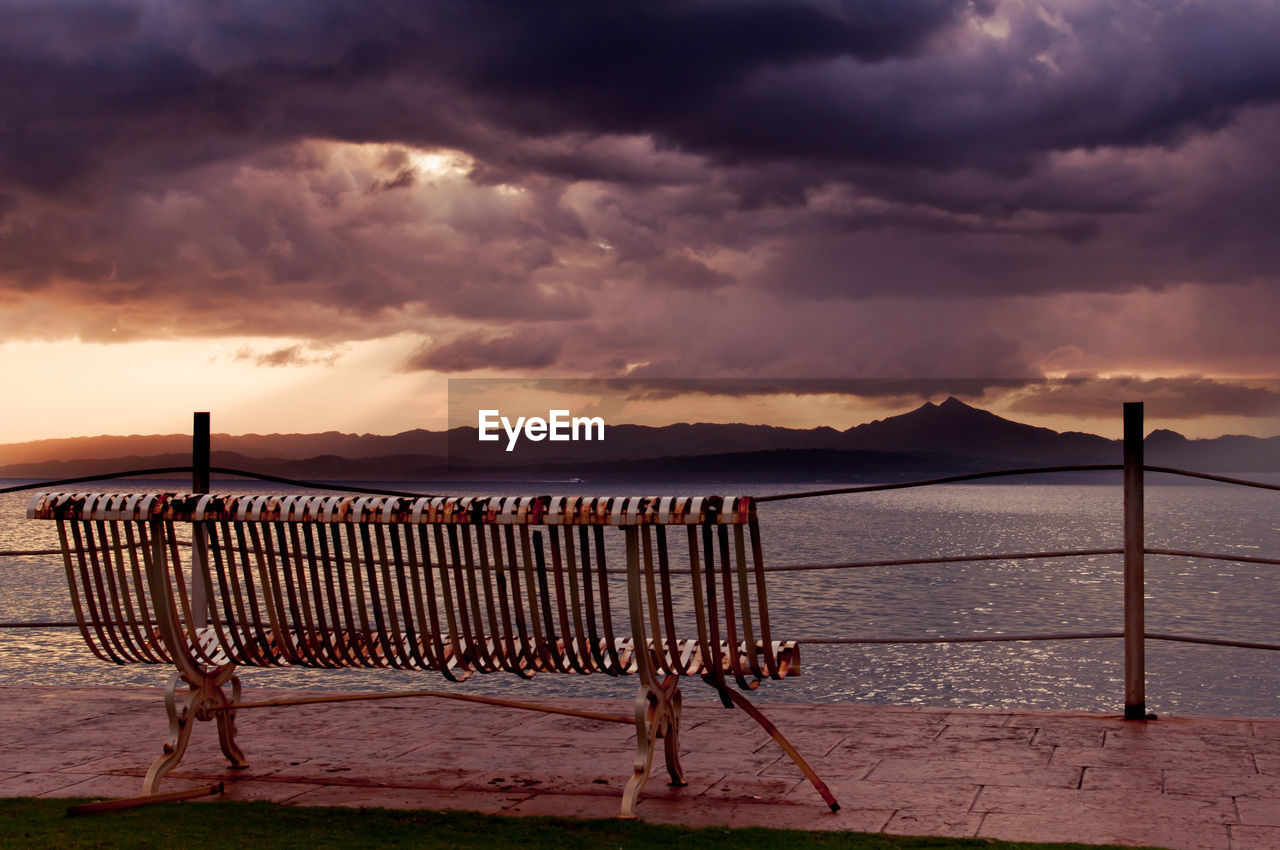 Scenic view of beach against sky during sunset