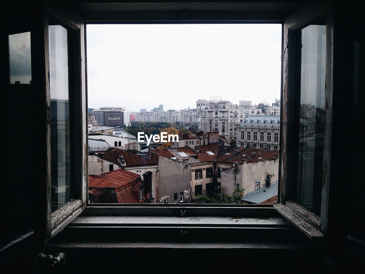 View of cityscape through window