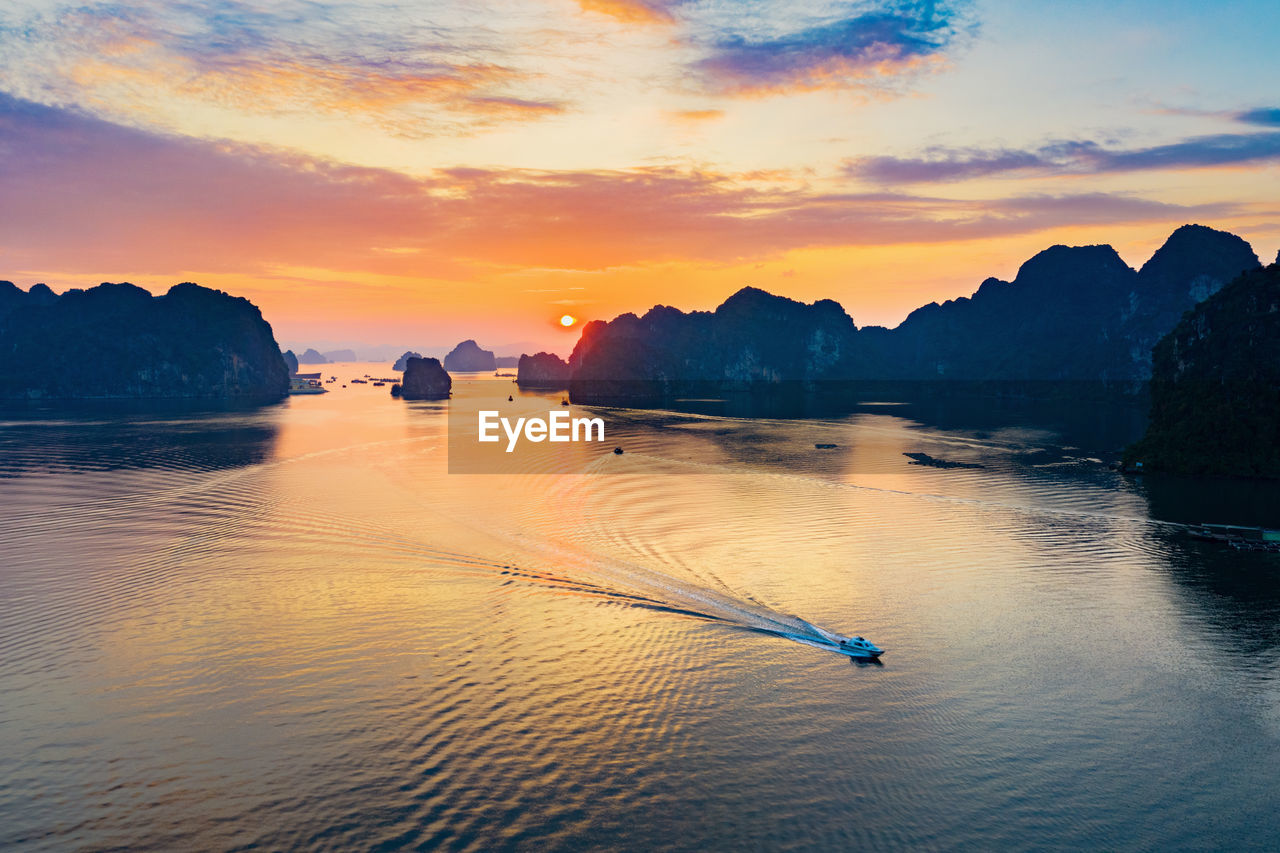 Scenic view of sea against sky during sunset