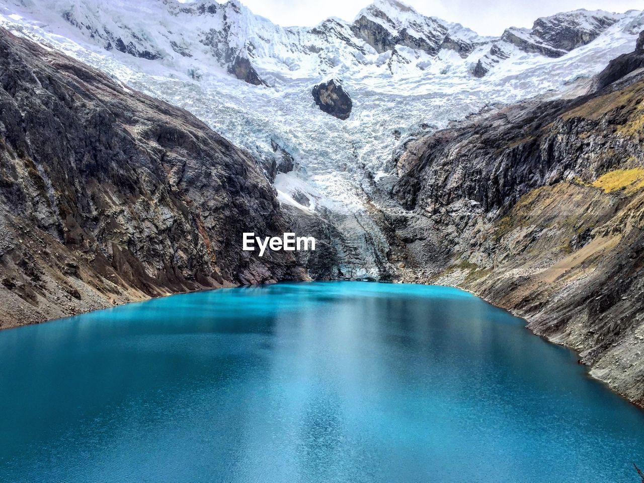 SCENIC VIEW OF SWIMMING POOL BY LAKE