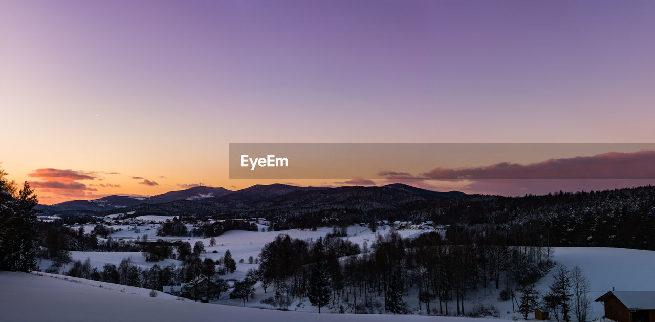 Scenic view of village during sunset