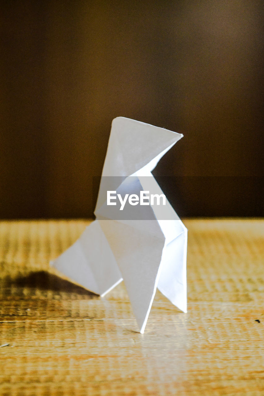 Close-up of paper origami on table