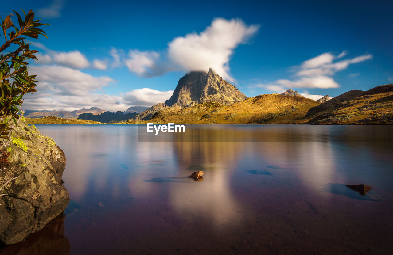 Scenic view of river and mountain