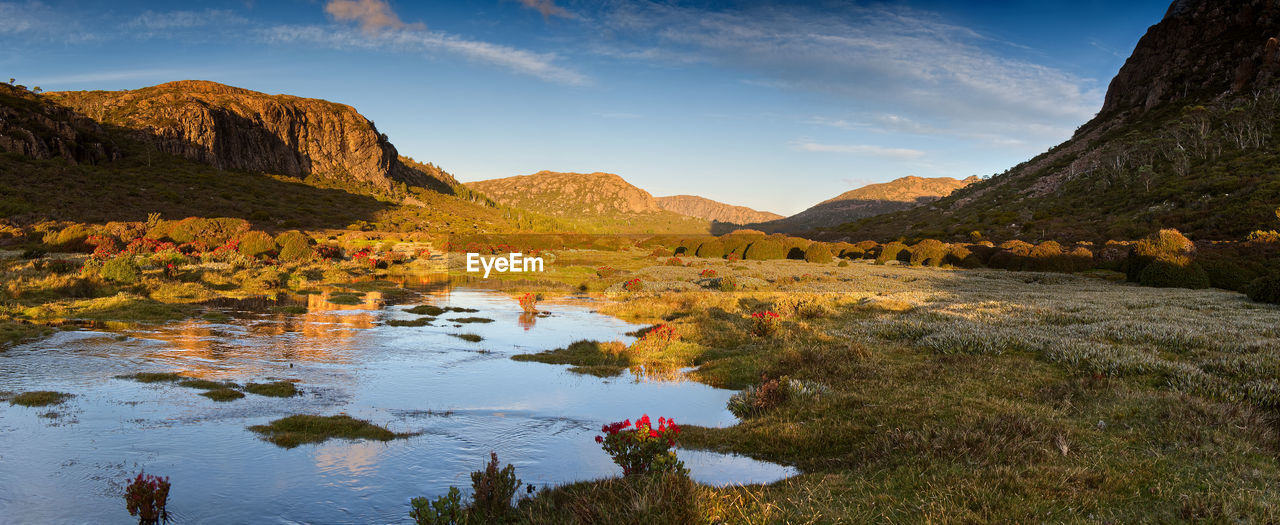 Mountain lake reflecting mountains in late afternoon light at walls of jerusalem national park