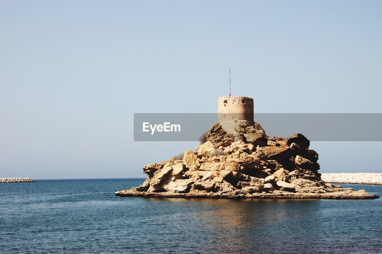 A old tower on a rock in oman