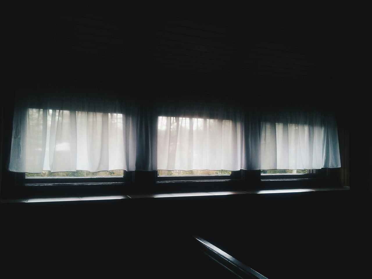 View of windows with curtains