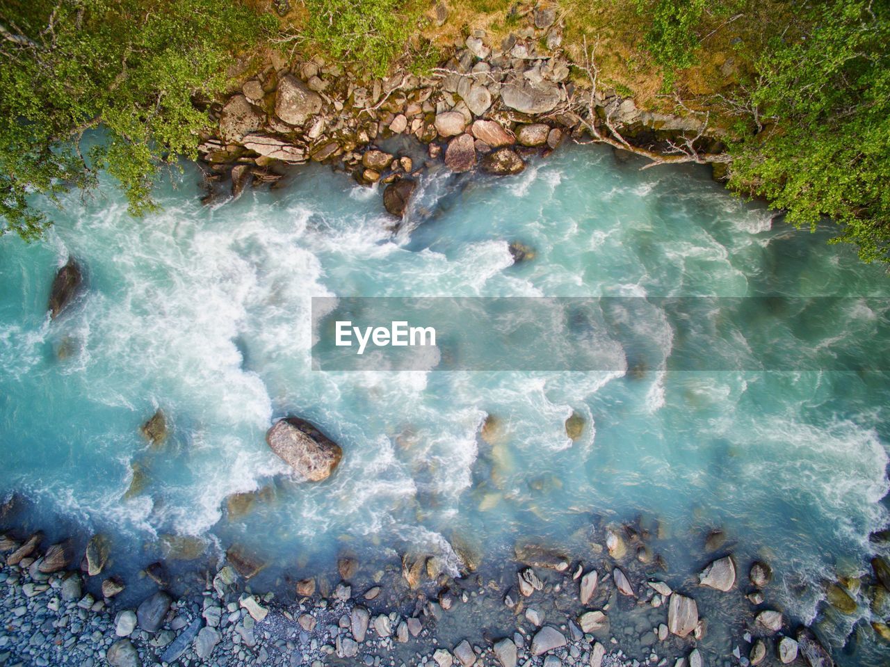 High angle view of rocks in a river