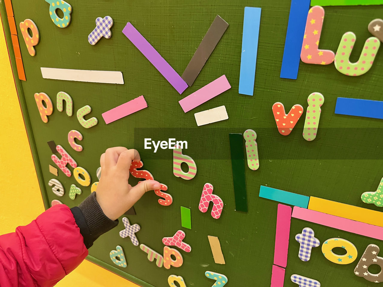 high angle view of toy blocks with text on table