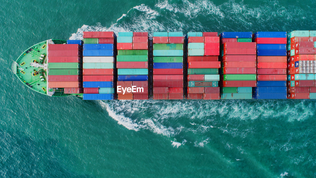 Aerial view of container ship on sea