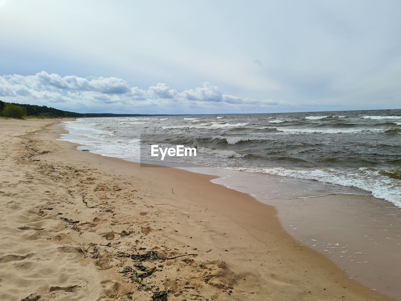 Scenic view of beach against sky