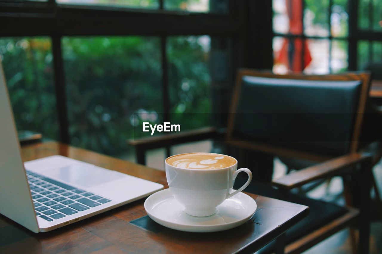 Coffee cup on table