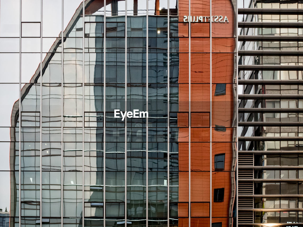 LOW ANGLE VIEW OF MODERN BUILDINGS